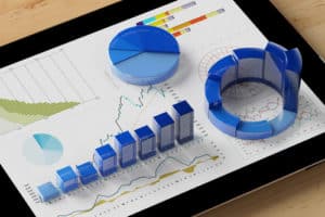 Financial data dashboard with 3D blue charts.